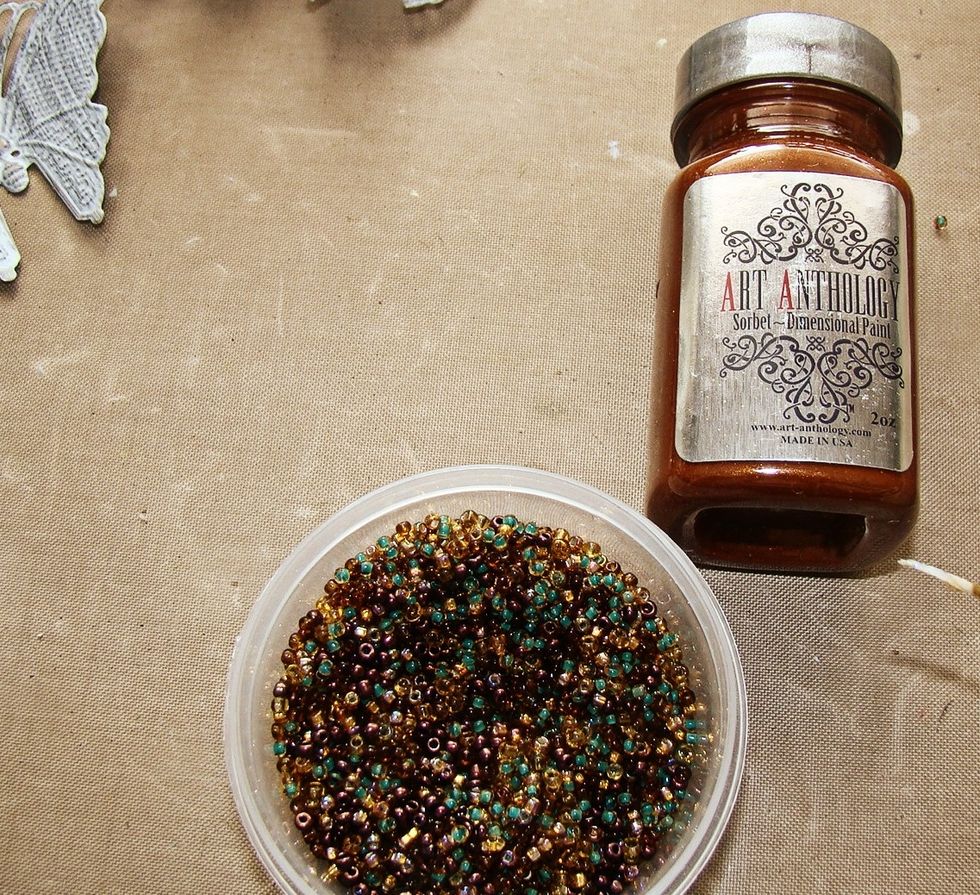 Using Sorbet in Copper and Red Velvet I dipped my paint brush in the seed beads and applied to the centers of my sunflowers. Allow to dry completely.