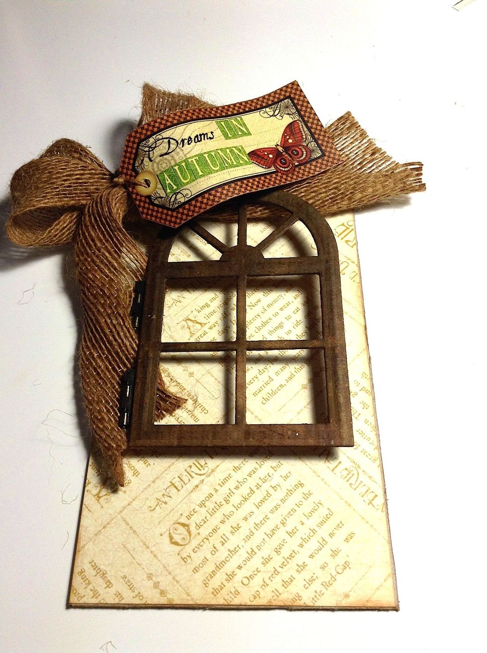 Using taky glue adhere only the hinges of the window.