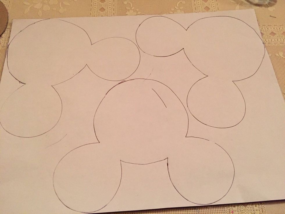 Using template, draw Mickey head onto black felt. I used adhesive back felt which made it easy to see the lines, it also is thicker which made it more sturdy. You will need two heads per Mickey.