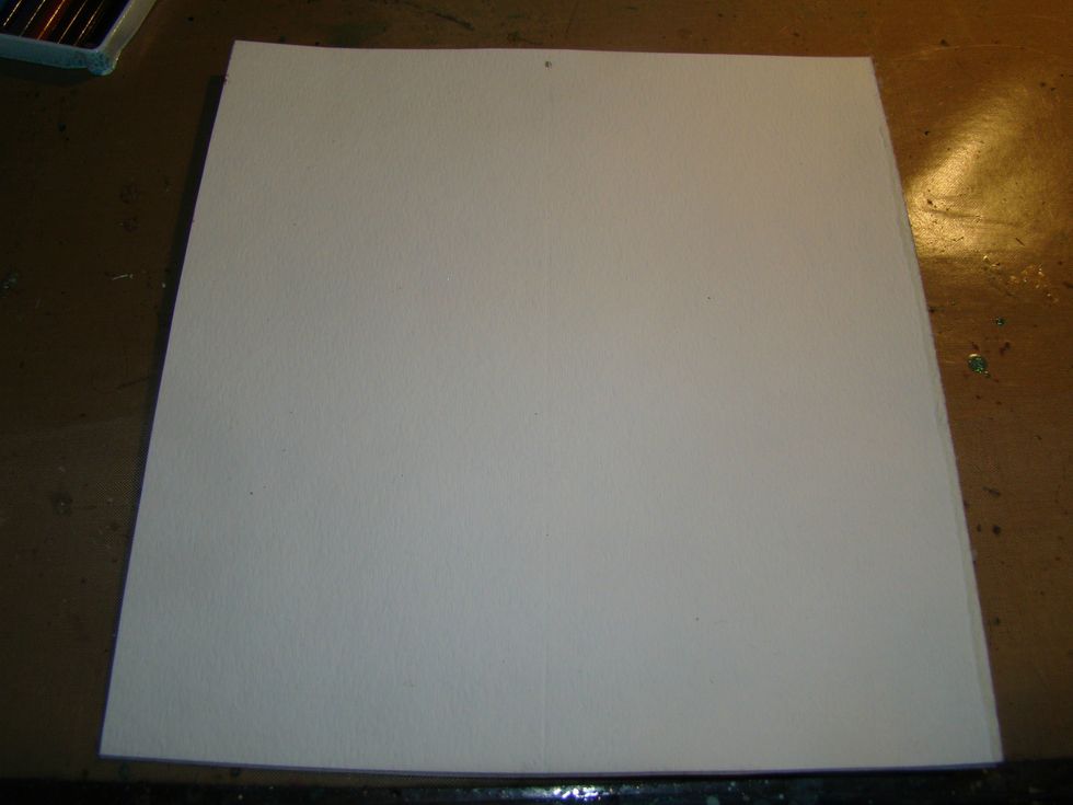 Using the back of the frame dimensions, cut yourself a piece of chipboard for your foundation.