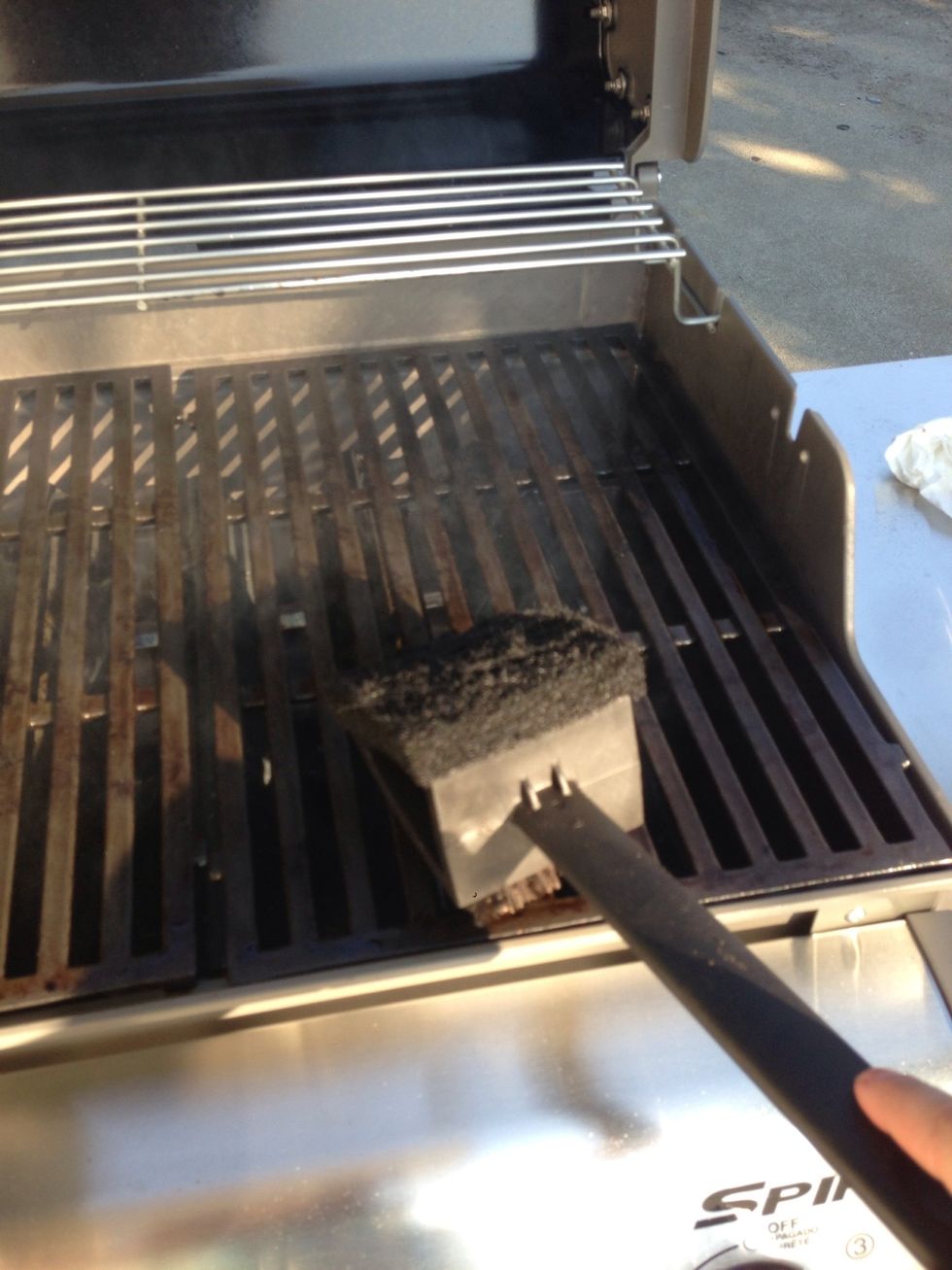 Using the BBQ cleaner, use the bristle side to get off the food particles. After you are finished, use the soft side.