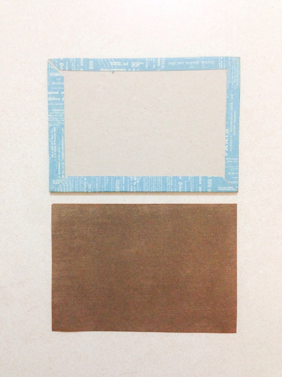 Using the brown paper from the 6" x 6" Solids & Patter paper pad, trim a 5" x 3.5" dark brown paper as shown... Glue it onto the back of the chipboard... This will be the base of the frame...