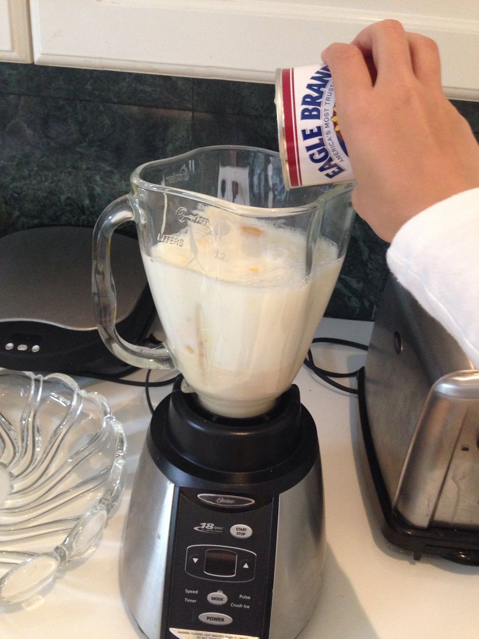 Using the can, add 2 cans of milk