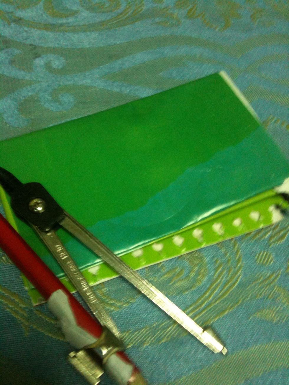 Using the compass draw a circle (the bigger the circle the better the roses)