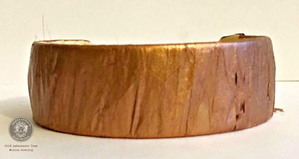 Using the copper paint from the VerDay Paint system, brush on one layer of the paint and let it dry thoroughly. After the first coat is dry, brush on a second coat. Spray with patina spray.