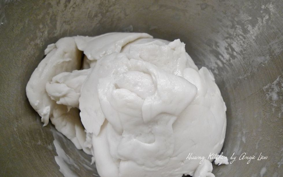 Using the dough hook and on low speed, knead into a dough.
