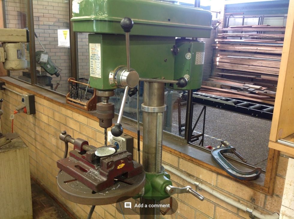 Using the drill press, clamp your Wax catcher and line up the drill bit with the indent in you wax catcher. Turn on the drill press and press down with not to much pressure. Soon the hole will be made