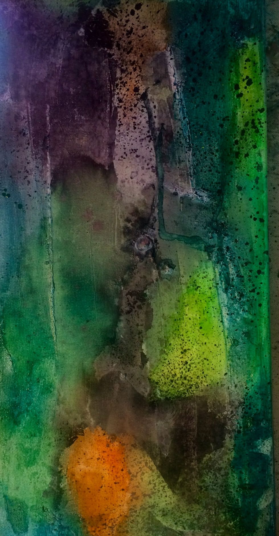 Using the Fiji and Veridian, with my finger I applied it to the blue and green areas to intensify the color of the mists. I sprayed Raider on my craft mat then using a brush and my finger splattered.