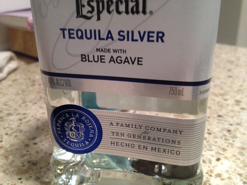 Using the frozen limeade mix empty can, measure out one can of your choice of tequila. Add to the limeade.