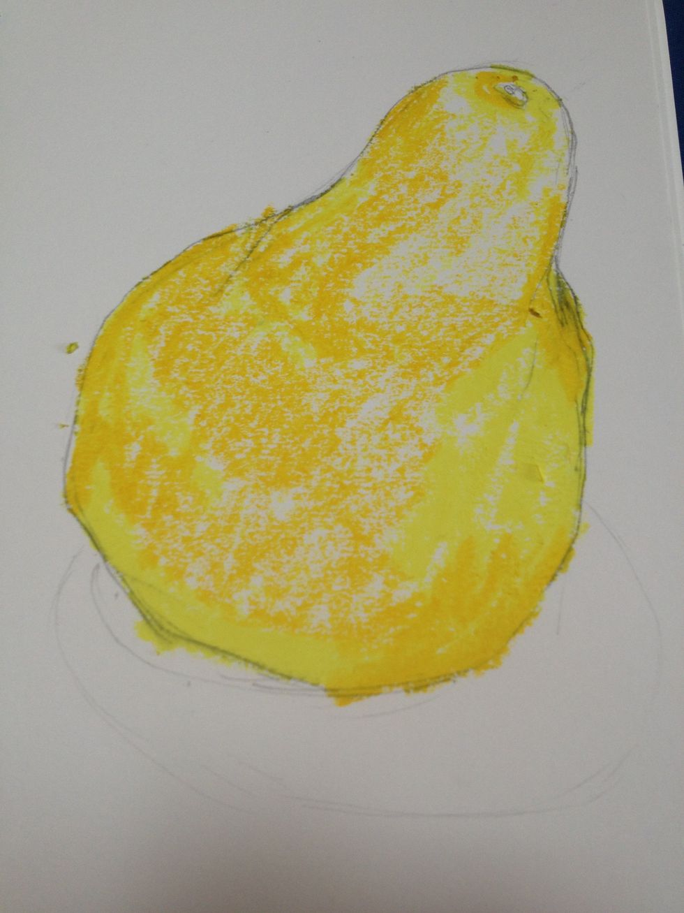 Using the gold color, I added pastel to start shading for form, just like with the charcoal. I also added more where I want the pear to have a more golden rather than yellow look.