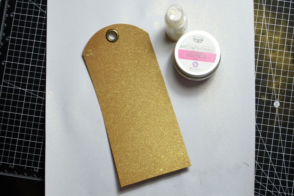 Using the Gold Iridescent Mica Powder, add a little to some water in a spritz bottle to create a mist and lightly mist the tag. It gives a gorgeous, shimmery gold effect.