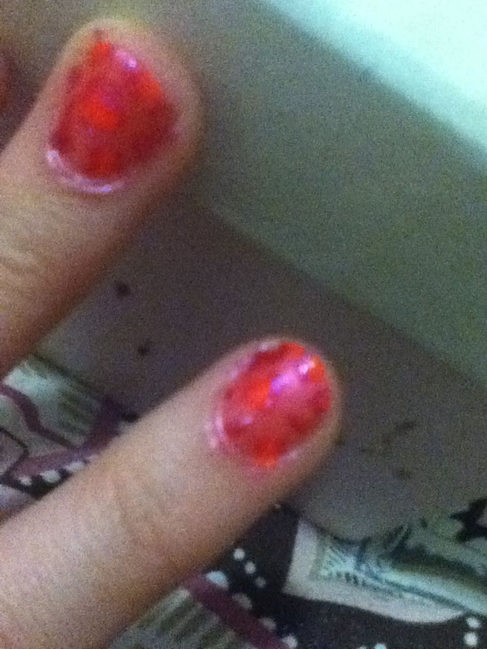 Using the hot pink again add random dots and lines in the spaces (with the pointy end of the toothpick)