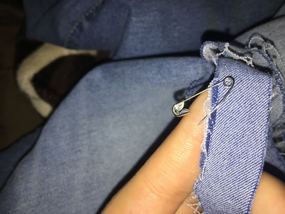 Using the needle( safety pin), pull out the horizontal strands, one by one if needed.