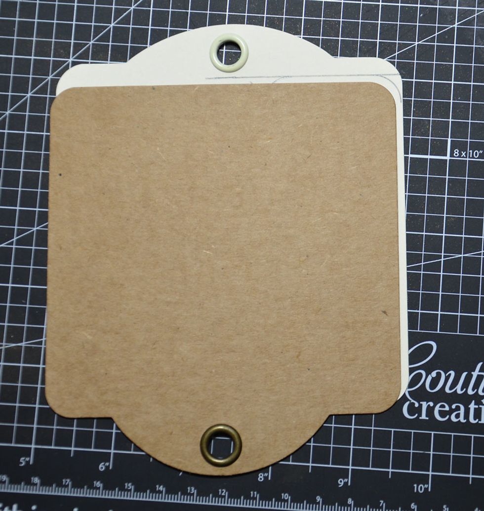 Using the other tag place along the top line and trace around the corner again.