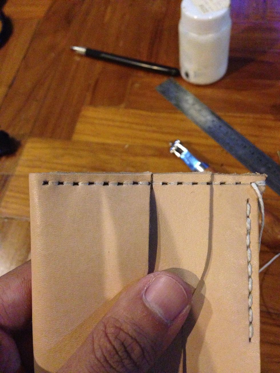 Using the same method on step 18 to mark the stitching hole and then start to stitch on both side