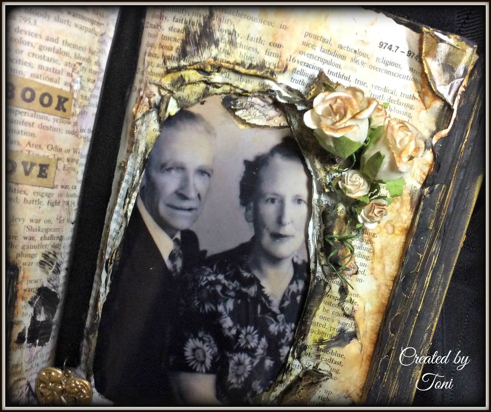 Using the same technique as before I glued more flowers around the outside of the frame.