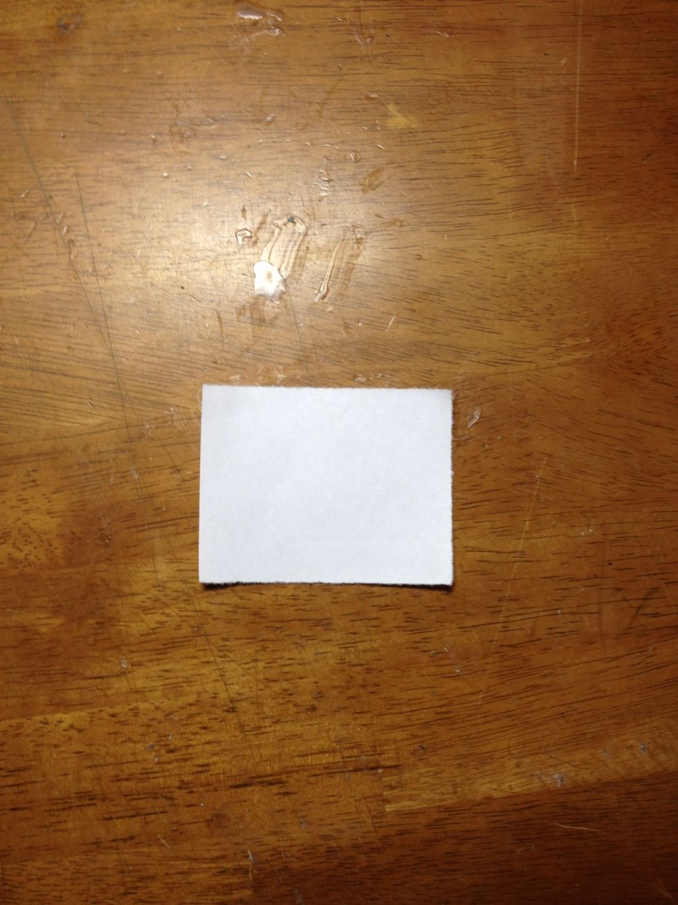 Using the scissors, cut out each of the 16 rectangles.