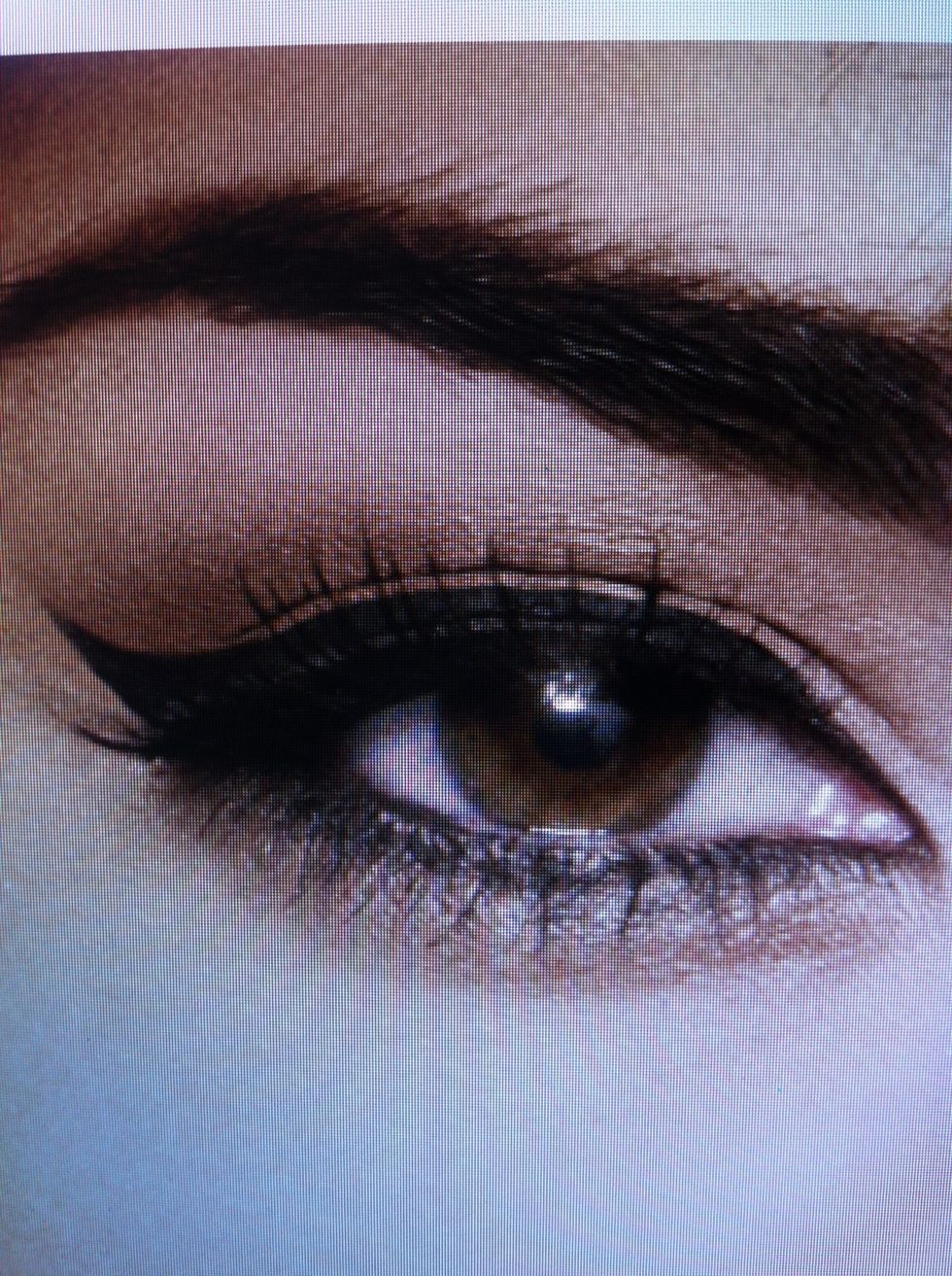 Using the Smashbox Brow Tech and Angle Brow Brush #12, brush through brows with powder and follow with wax.