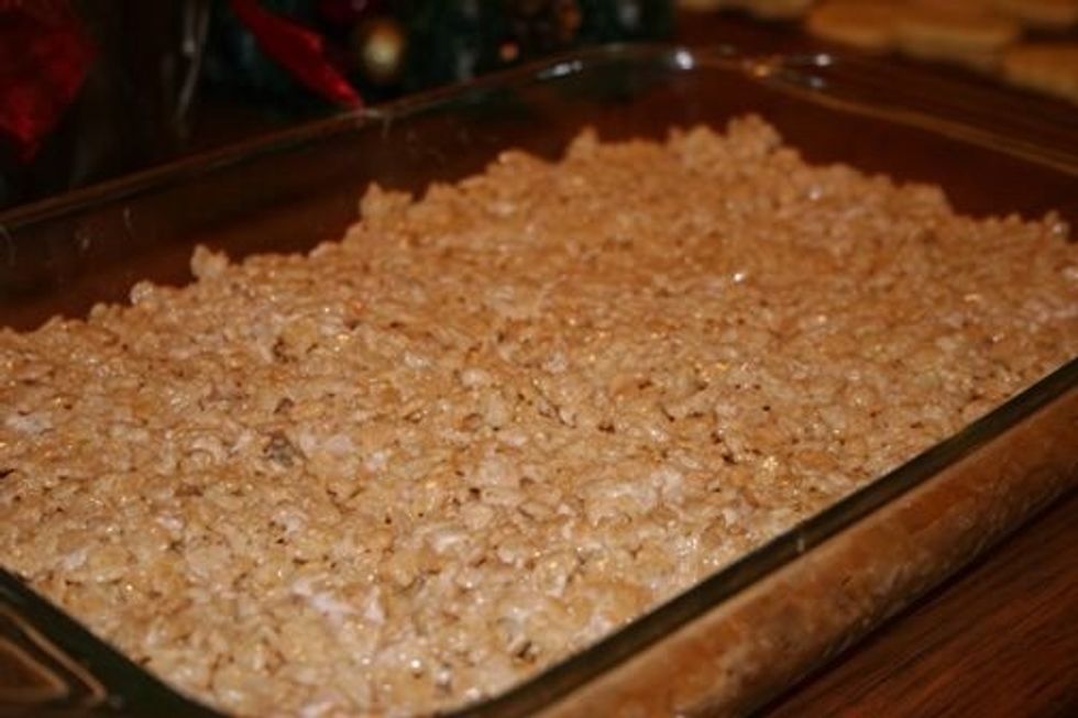 Using the spatula evenly spread the mixture that's in the saucepan onto the baking pan. Allow to cool.