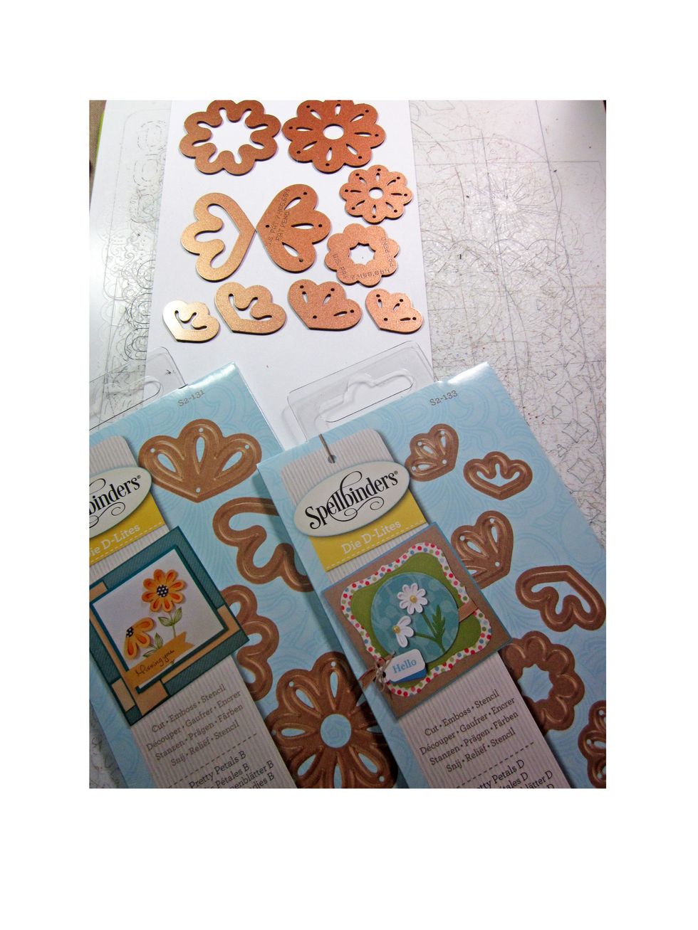 Using the Spellbinders Die and cut out from plain white card stock various petals.
