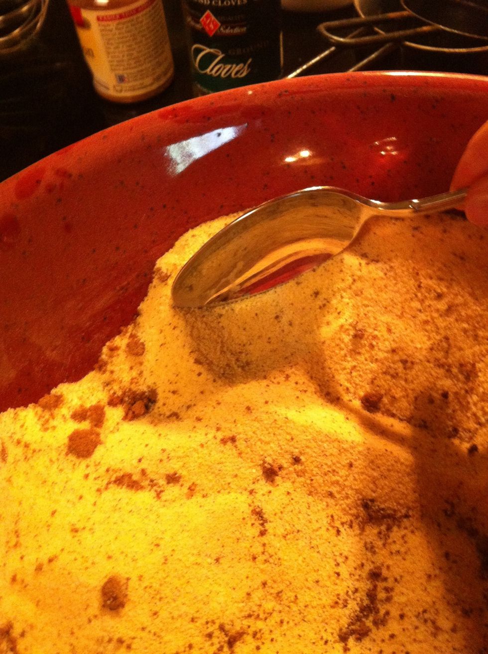 Using the spoon, break up/ crush all the lumps