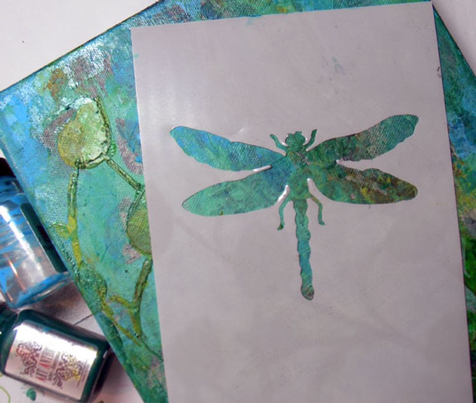 Using the stencil I made, I decided where I wanted to put it on my canvas.