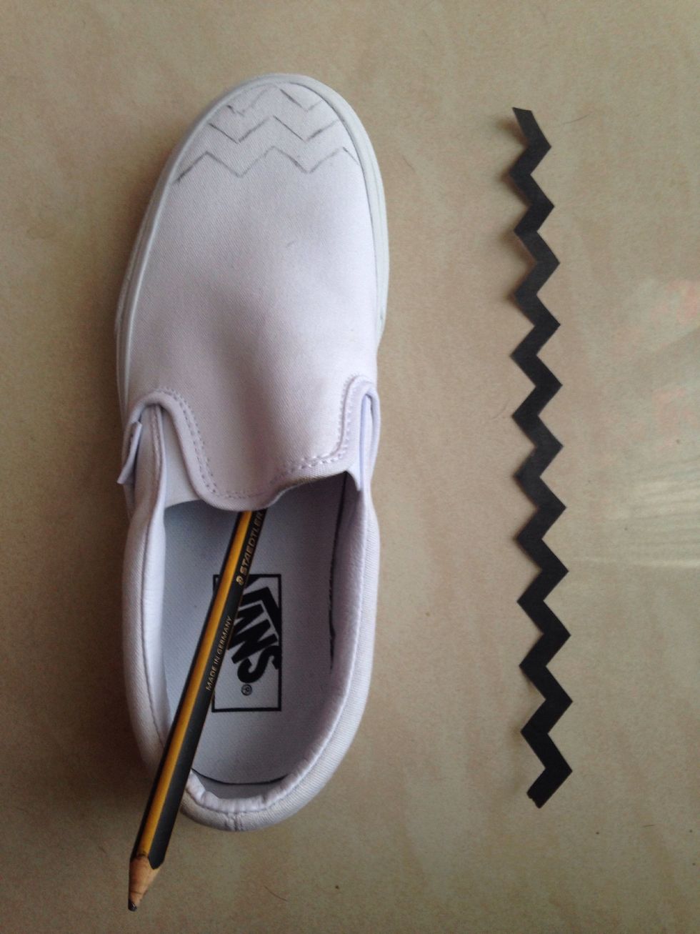 Using the stencil - start drawing on the shoe