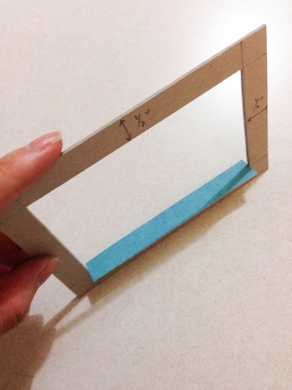 Using the strips you have prepared in Step 7, line and glue down the strips on the inside of the chipboard frame as shown...