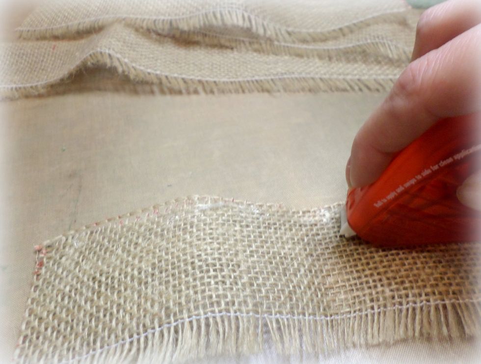 Using the Tombow Xtreme Adhesive Runner I ran a line of adhesive down 1 side of my strip. This adhesive is so strong it holds burlap!