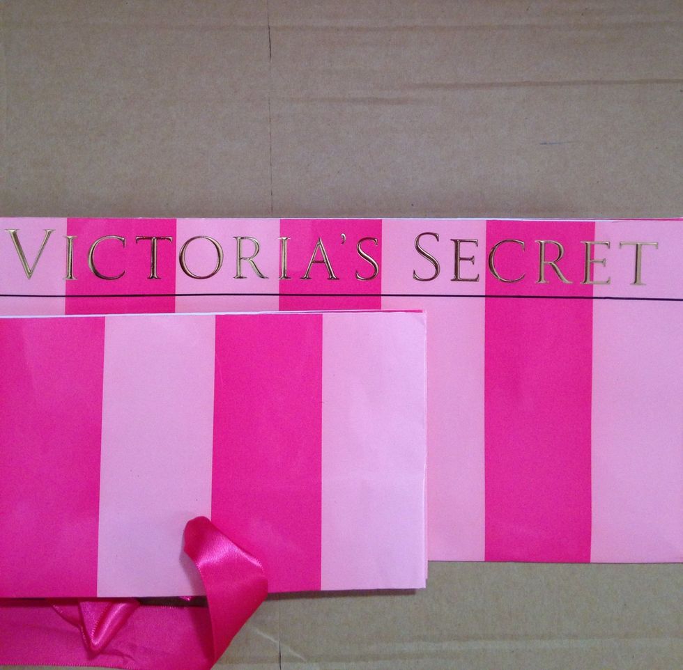 Using the upper piece as your guide, draw a line across the bottom piece measuring the same height.