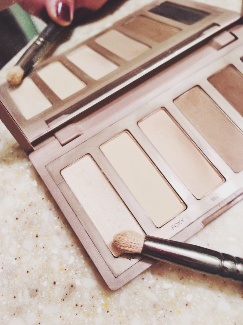 Using the Venus color, highlight underneath your eyebrow on the brow bone. Also highlight the inner corner of your eye.