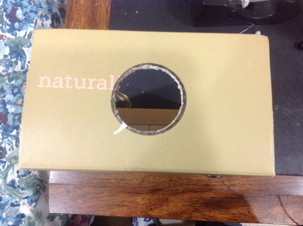 Using the X-Acto Knife, cut out the traced hole.