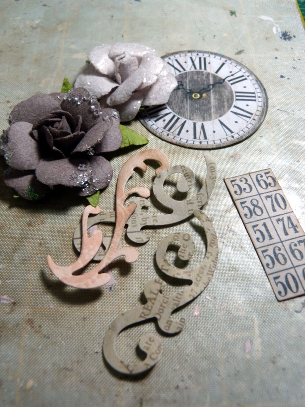 Using these items, and some die cut swirls I cut myself from my own dies, .......