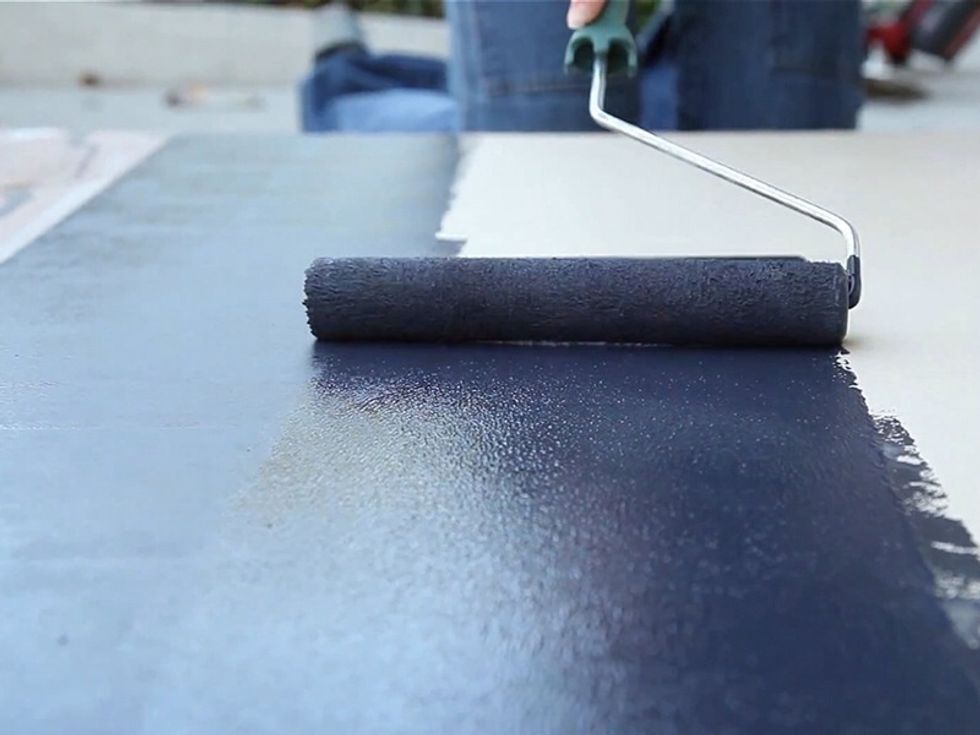 Using thin Masonite as your surface, apply a thick coat of chalkboard paint and allow it to dry. You may need to apply multiple coats.