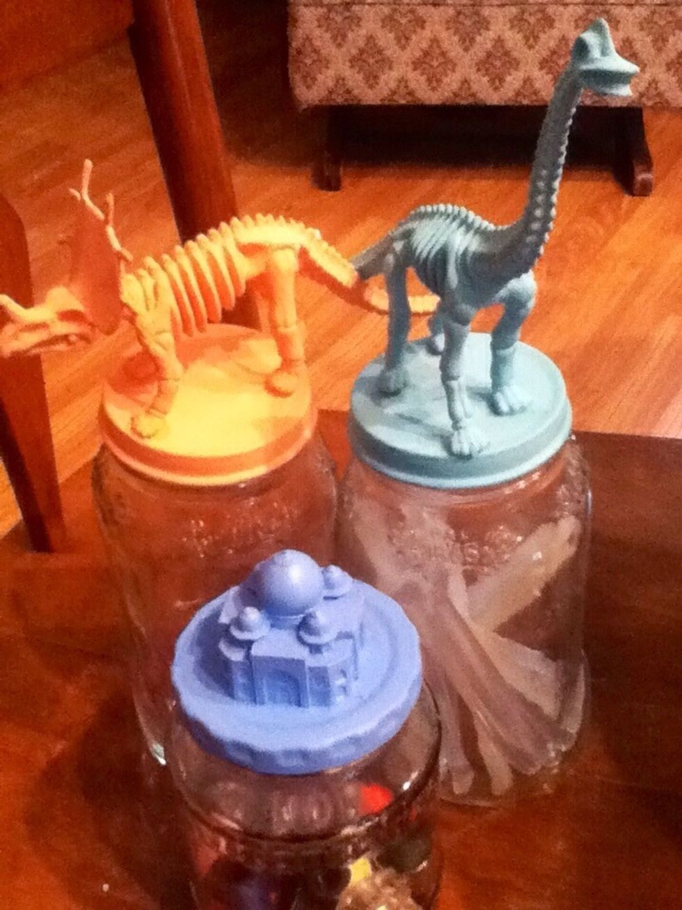 Using toy dinosaurs or other animals for a kids room (or the kid at heart's) is neato. I love keeping craft supplies in them! You can do it! Go try!
