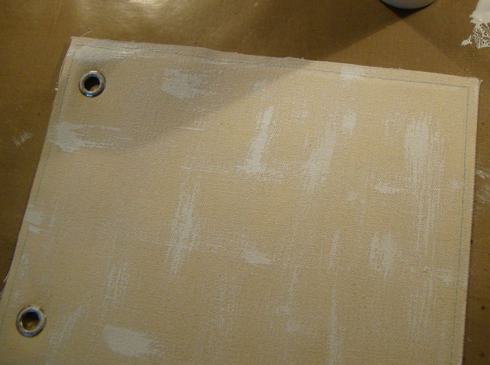 Using white acrylic paint, dry brush strokes randomly.