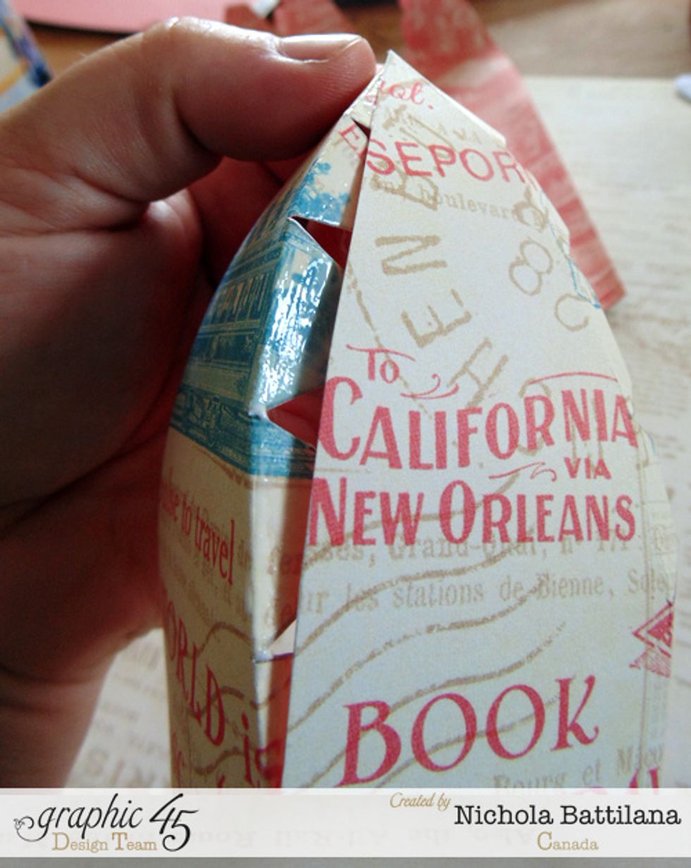 Using white tacky glue along the notched edge, align the top point and bottom edge of your pieces. Ease them so that they fit together. This part will be fiddly!