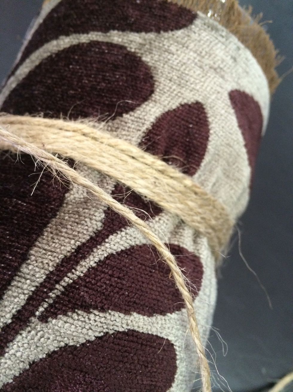 Using yarn/string, glue around the centre to create more depth. (Optional)