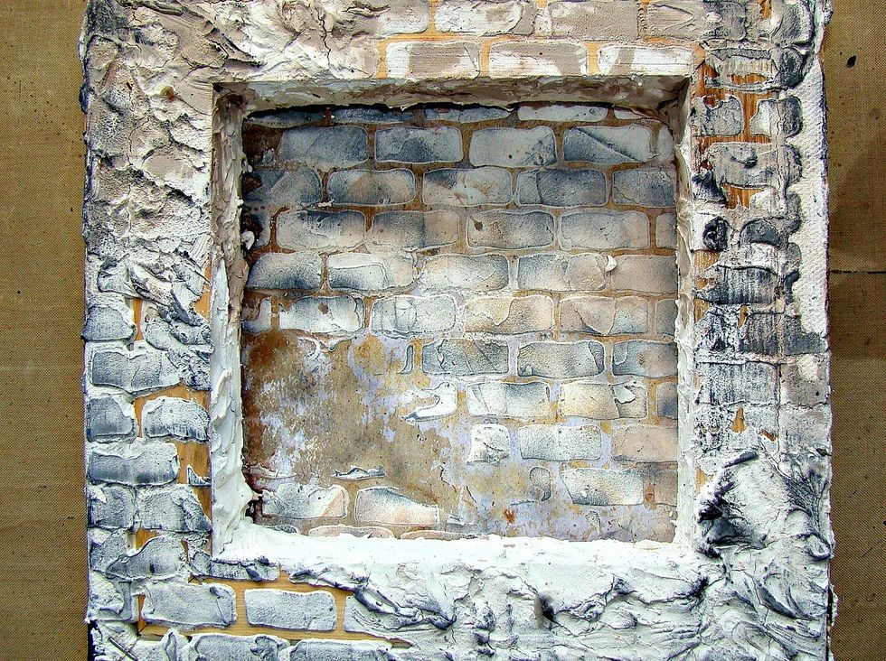 Using your Black Leather Jacket and French Toast repeat the same process as earlier. I also smudged AA's Stone Effect in Concrete over the tops of the bricks.