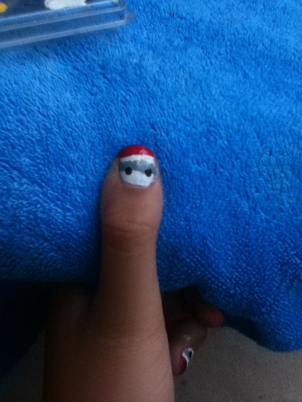 Using your bobbypin or dotting tool, create two black dots for eyes. Make sure they are half on the white, and half on the grey.