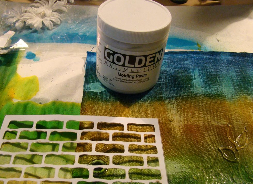 Using your brick stencil, apply molding paste and allow to dry completely. You will notice that the Dylusions will bleed into the modeling paste, but that is ok, that's the look you want.