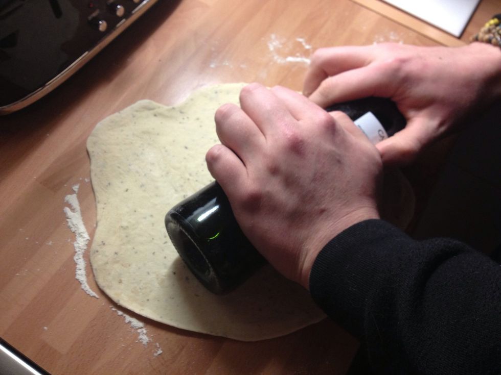 Using your favourite wine!! Roll out the dough to as thin as you like it... The thinner the better!!! Note, must be Italian wine! ;-)