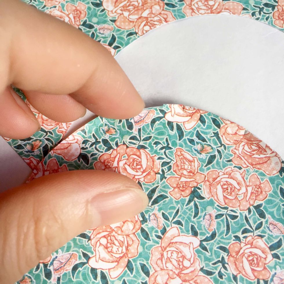 Using your fingernail, gently pull up the snips to curve the edges.
