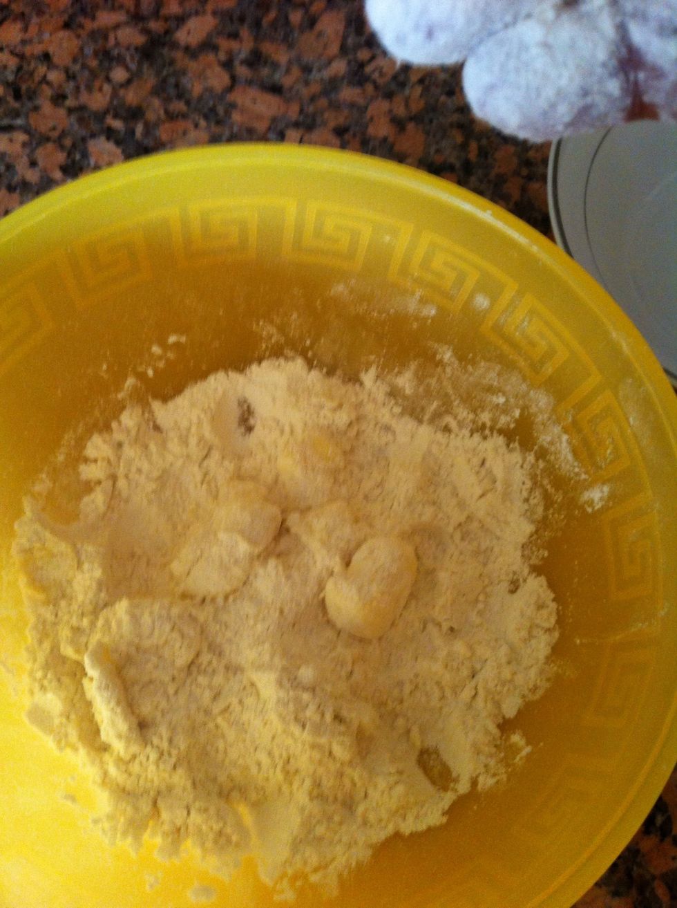Using your fingers, start rubbing the butter fast with the flour as your are trying to squeeze the butter with the flour