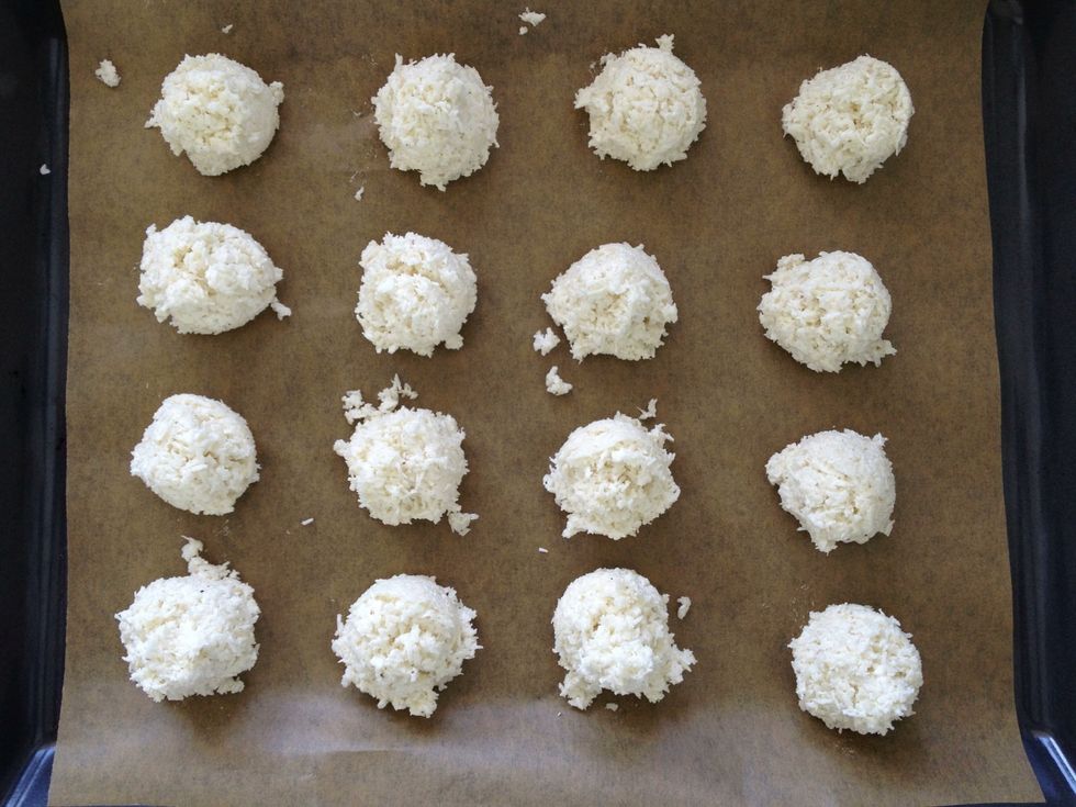 Using your hands or an ice cream scoop divide the mixture into 16 mounds of loveliness and place on the lined baking tray. Weigh them if you're a little OCD - mine were approximately 30g each.