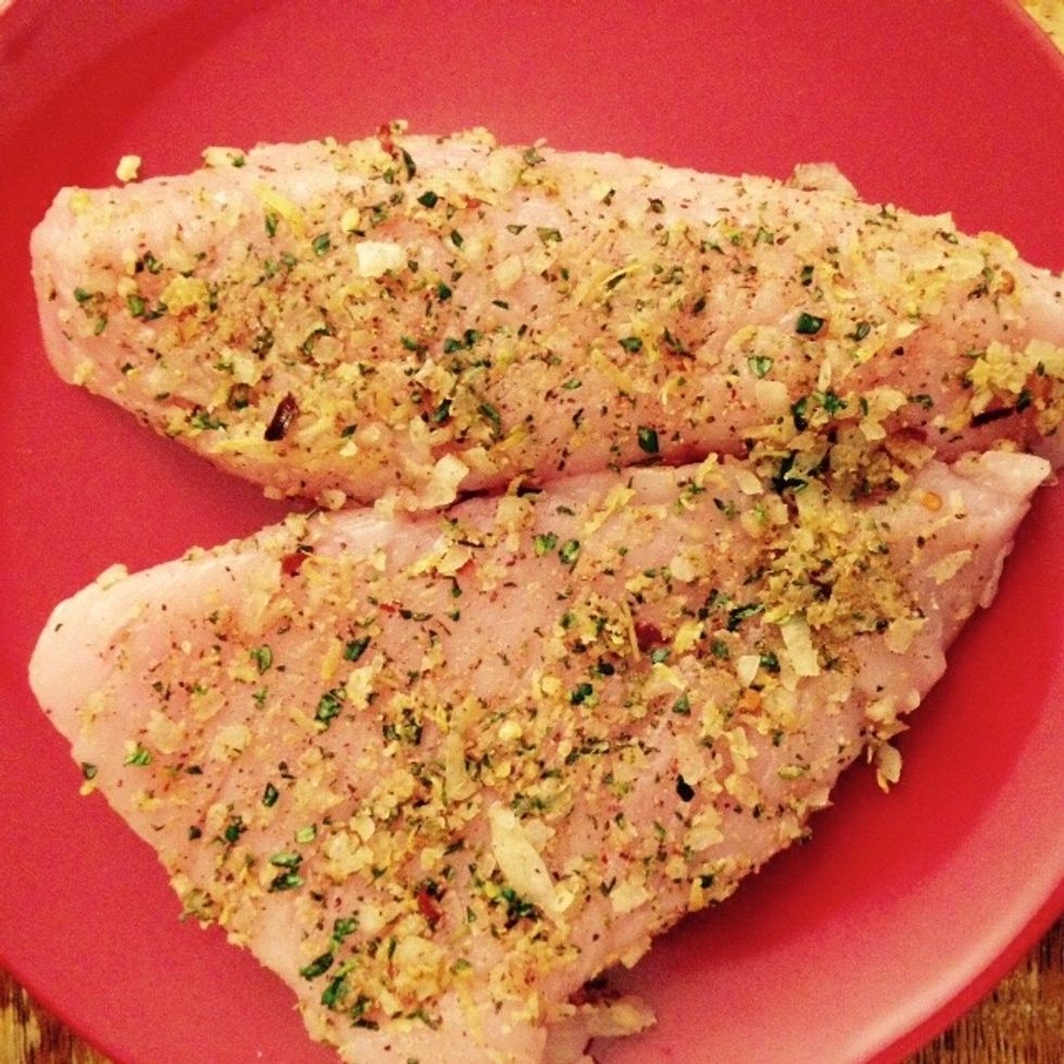 Using your hands spread the dry mix on all sides of the fillets and leave in the fridge for 30 min