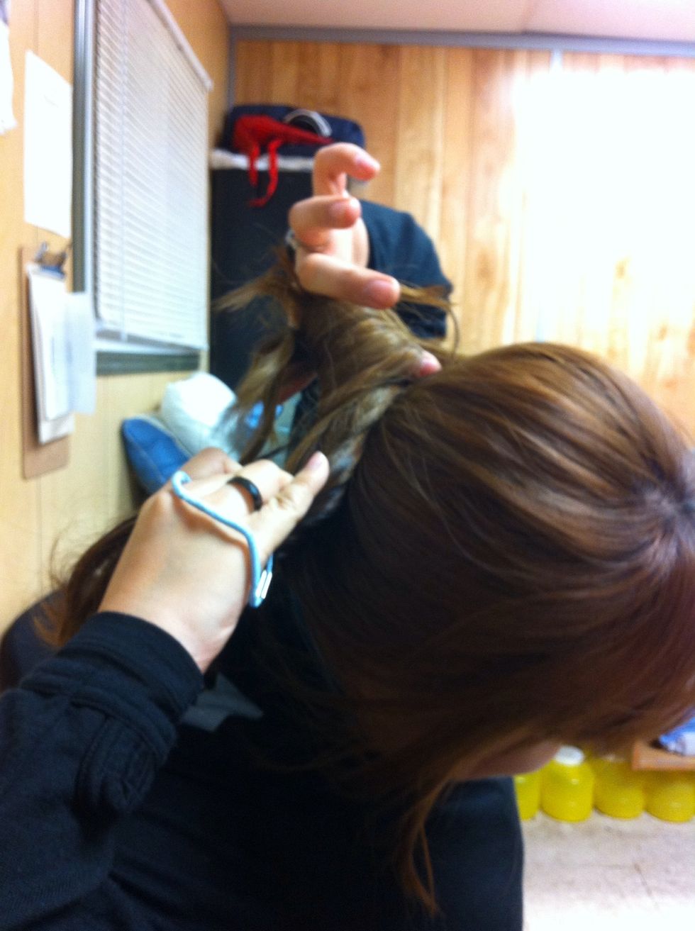 Using your index finger as a centre, twist your hair