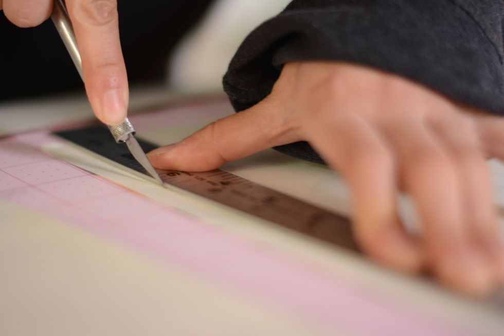 Using your measurements, cut or slice your decorative paper to the appropriate size.  Make sure you see that it fits after you have your paper cut to size.