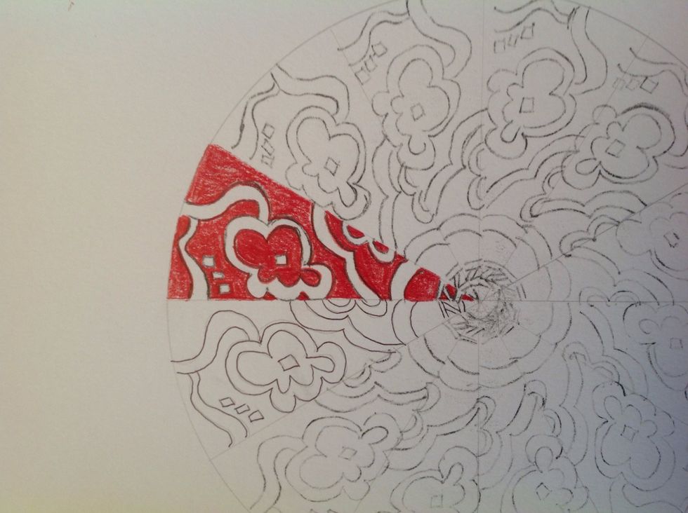 Using your red pencil, choose a section to start with and color the piece. I chose to only color the negative space of this piece. I will only color the positive drawing in the next piece.