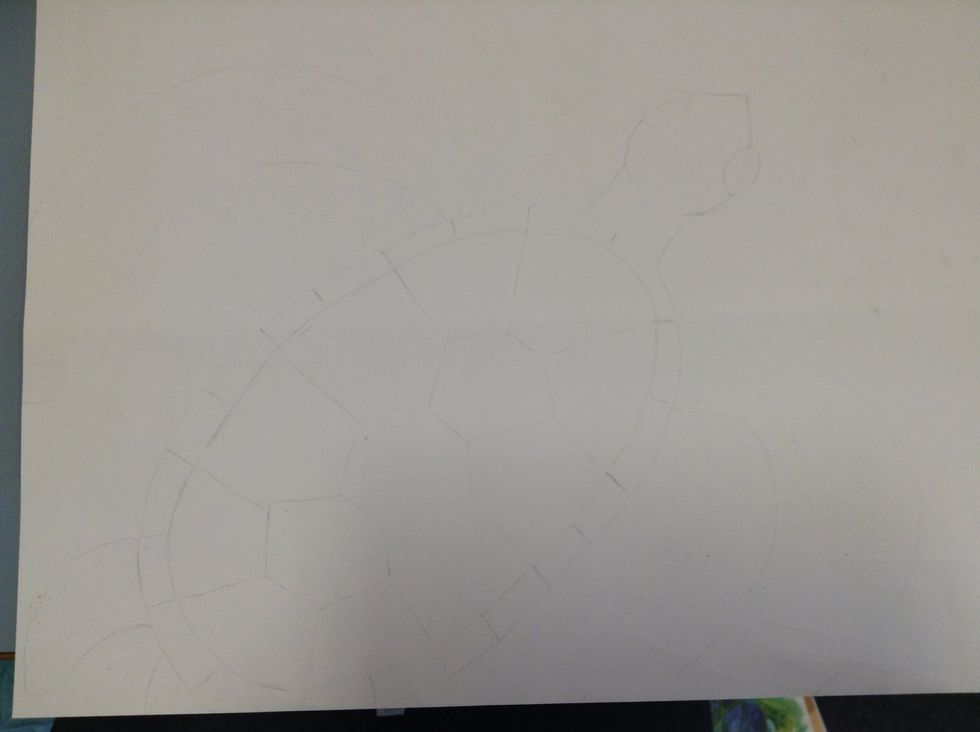 Using your rubber, lightly erase the lines you havre drawn so that you can just see them.